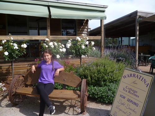 Ravina sitting outside the tea rooms